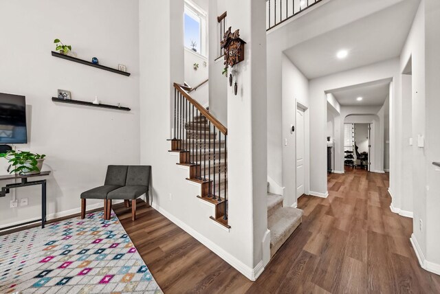 4404 Cierne Cv, Round Rock, TX 78681 - stairs with wood finished floors, baseboards, and recessed lighting