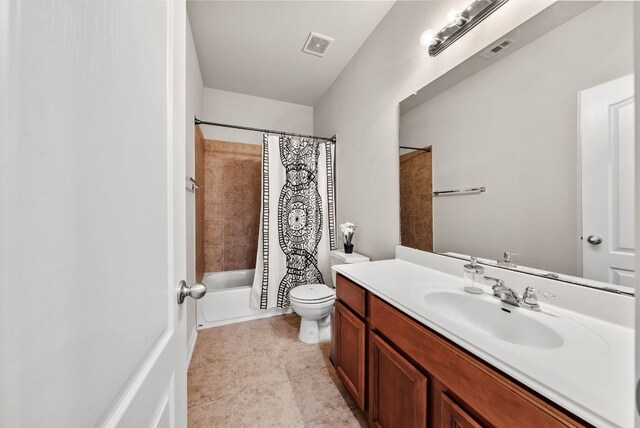 4404 Cierne Cv, Round Rock, TX 78681 - full bath featuring vanity, toilet, shower / bathtub combination with curtain, and tile patterned flooring