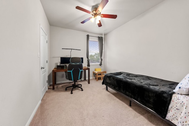 4404 Cierne Cv, Round Rock, TX 78681 - bedroom featuring light colored carpet, baseboards, a ceiling fan, and a desk
