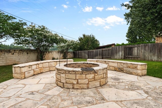 4404 Cierne Cv, Round Rock, TX 78681 - fenced backyard featuring a fire pit and a patio