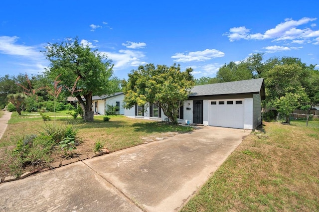 5808 Cedardale Dr, Austin, TX 78745 - view of front facade featuring driveway and an attached garage