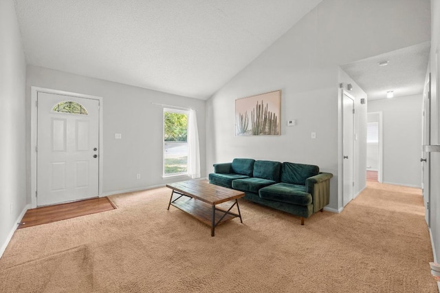 5808 Cedardale Dr, Austin, TX 78745 - living room with light carpet, baseboards, a textured ceiling, and lofted ceiling