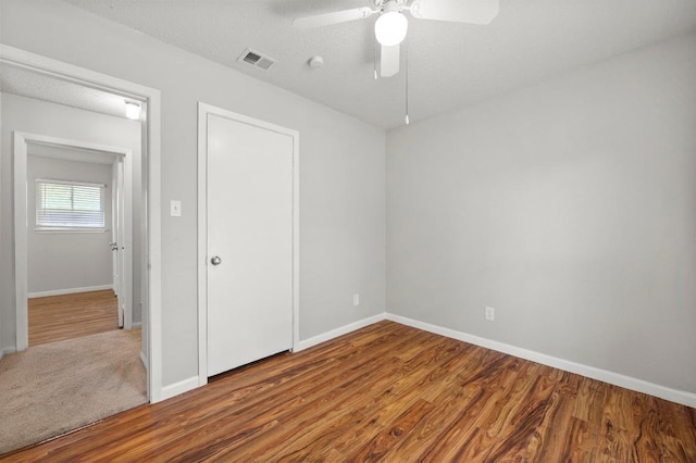 5808 Cedardale Dr, Austin, TX 78745 - unfurnished bedroom featuring wood finished floors and baseboards