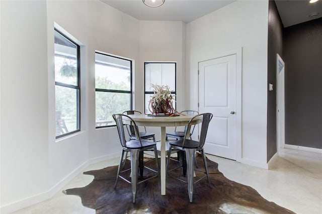 1215 Ridge Harbor Dr, Spicewood, TX 78669 - dining area featuring plenty of natural light and baseboards