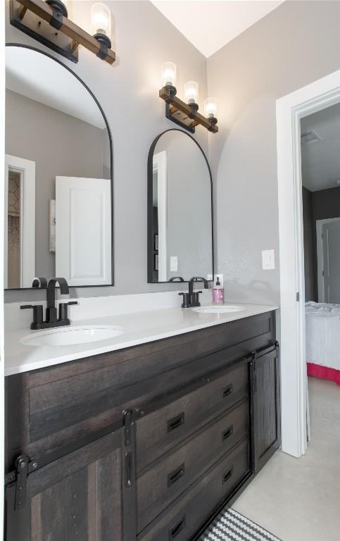 1215 Ridge Harbor Dr, Spicewood, TX 78669 - full bathroom featuring double vanity