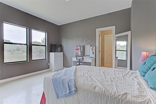 1215 Ridge Harbor Dr, Spicewood, TX 78669 - carpeted bedroom featuring baseboards
