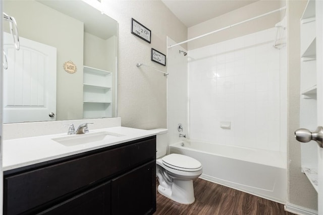 208 Shiner Ln, Georgetown, TX 78626 - full bath featuring toilet, wood finished floors, vanity, and shower / bathtub combination