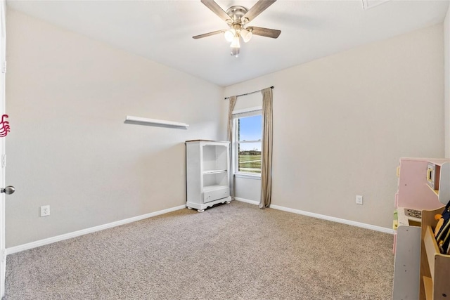 208 Shiner Ln, Georgetown, TX 78626 - empty room with carpet floors, a ceiling fan, and baseboards