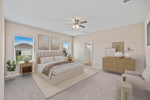 208 Shiner Ln, Georgetown, TX 78626 - carpeted bedroom with a ceiling fan and baseboards