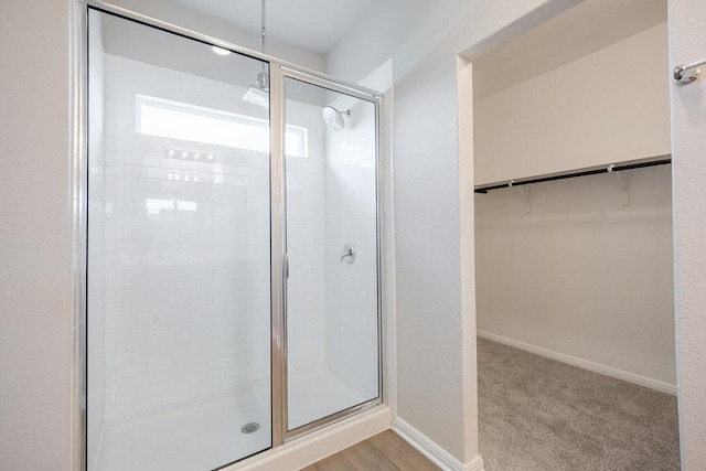 208 Shiner Ln, Georgetown, TX 78626 - bathroom featuring a shower stall and a spacious closet