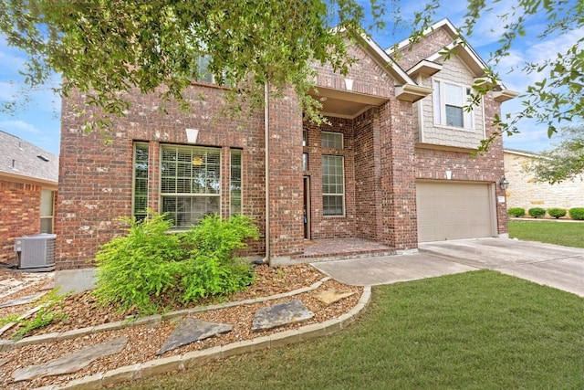 2817 Dusty Chisolm Trl, Pflugerville, TX 78660 - view of front of property featuring driveway, cooling unit, an attached garage, brick siding, and a front lawn