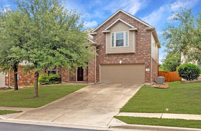 2817 Dusty Chisolm Trl, Pflugerville, TX 78660 - view of front of house with a garage, driveway, central air condition unit, and brick siding