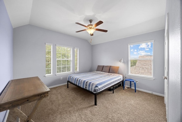 2817 Dusty Chisolm Trl, Pflugerville, TX 78660 - carpeted bedroom with multiple windows, baseboards, vaulted ceiling, and a ceiling fan