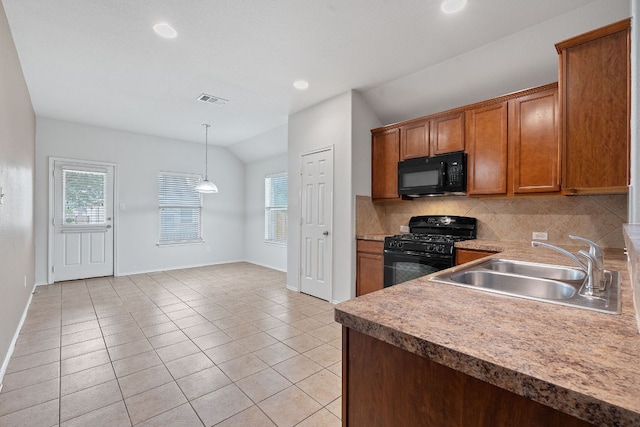 11117 Boundless Valley Dr, Austin, TX 78754 - kitchen featuring black appliances, a sink, lofted ceiling, decorative backsplash, and brown cabinets