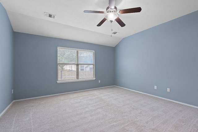11117 Boundless Valley Dr, Austin, TX 78754 - carpeted empty room featuring a ceiling fan, vaulted ceiling, and baseboards