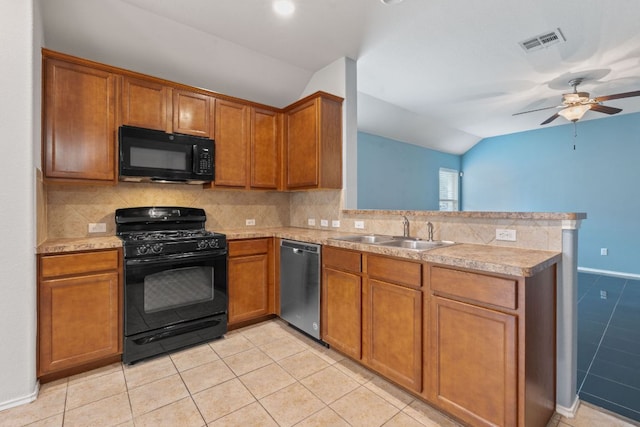 11117 Boundless Valley Dr, Austin, TX 78754 - kitchen with black appliances, a sink, lofted ceiling, a peninsula, and light tile patterned floors