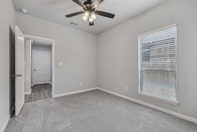 125 Bauer Loop, Liberty Hill, TX 78642 - carpeted spare room featuring a ceiling fan and a smoke detector