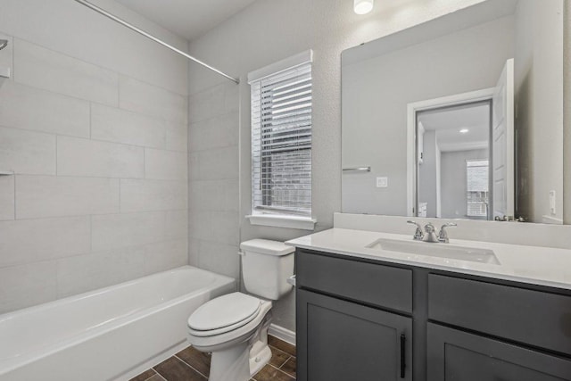 125 Bauer Loop, Liberty Hill, TX 78642 - bathroom with vanity,  shower combination, wood finished floors, and healthy amount of natural light