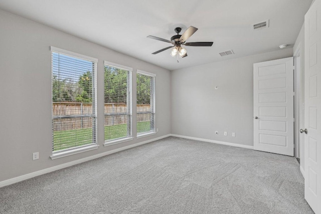 125 Bauer Loop, Liberty Hill, TX 78642 - carpeted empty room with a ceiling fan and a smoke detector