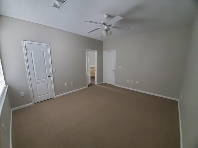 11203 Ranch Road 2222nd Rd Unit 901, Austin, TX 78730 - unfurnished bedroom featuring carpet flooring, baseboards, and ceiling fan