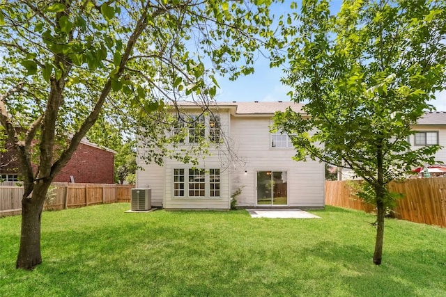 501 Thicket Ln, Kyle, TX 78640 - back of house with cooling unit and a patio
