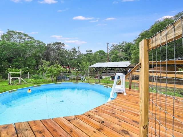 1576 Westview Court Dr, Canyon Lake, TX 78133 - view of pool featuring a wooden deck and view of scattered trees