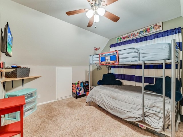 1576 Westview Court Dr, Canyon Lake, TX 78133 - bedroom featuring carpet flooring, vaulted ceiling, baseboards, and a ceiling fan