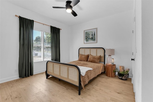 776 Butcher St, New Braunfels, TX 78130 - bedroom featuring light wood-style floors, baseboards, and a ceiling fan