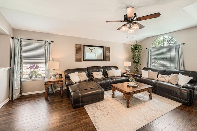 134 Sassafras St, Hutto, TX 78634 - living area featuring dark wood-type flooring, ceiling fan, baseboards, and lofted ceiling