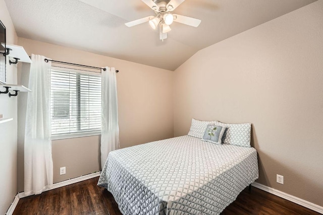 134 Sassafras St, Hutto, TX 78634 - bedroom with wood finished floors, baseboards, vaulted ceiling, and ceiling fan