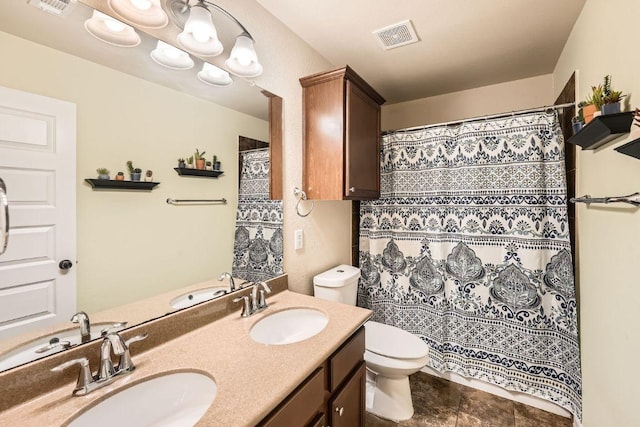 134 Sassafras St, Hutto, TX 78634 - full bathroom with toilet, double vanity, and a shower with curtain