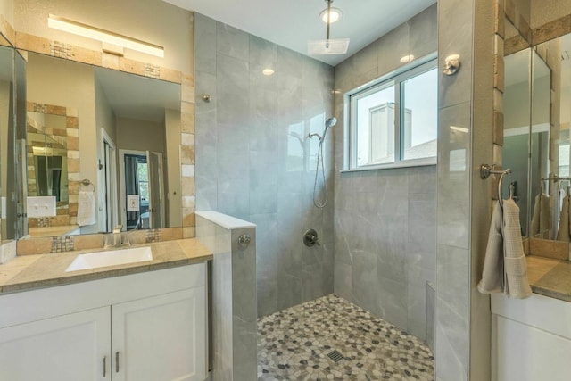 1125 Byers Ln, Austin, TX 78753 - bathroom with a walk in shower and vanity