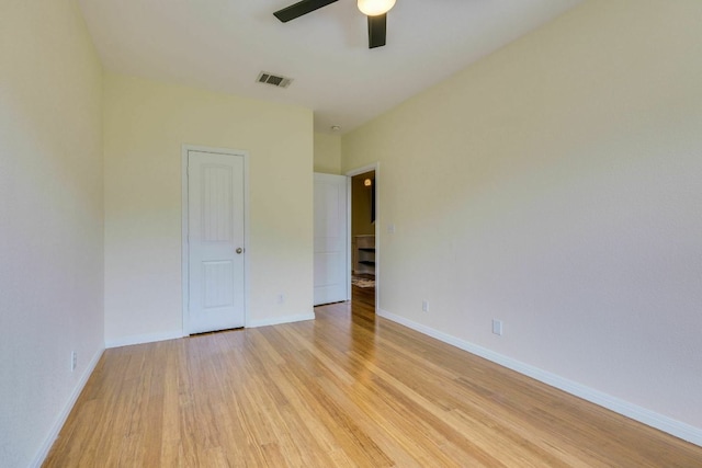 1125 Byers Ln, Austin, TX 78753 - spare room with light wood-style floors, ceiling fan, and baseboards