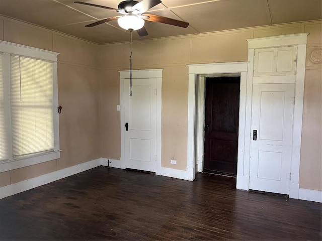 200 N Walton St, Granger, TX 76530 - spare room with dark wood-style floors and a ceiling fan
