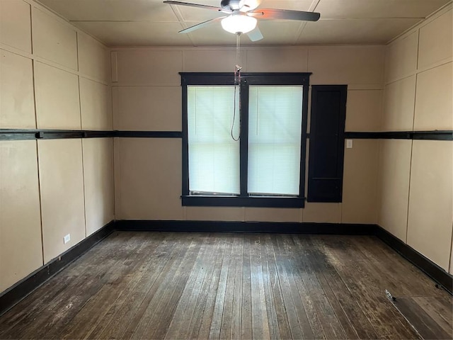 200 N Walton St, Granger, TX 76530 - spare room featuring ceiling fan and hardwood / wood-style floors