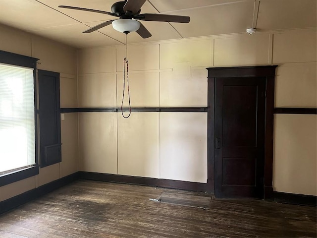 200 N Walton St, Granger, TX 76530 - spare room featuring a ceiling fan and wood finished floors
