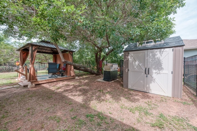 121 Cedar St, Granite Shoals, TX 78654 - fenced backyard featuring a gazebo