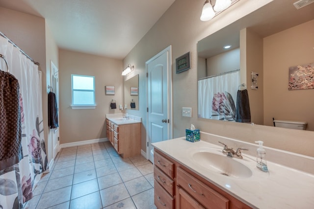 121 Cedar St, Granite Shoals, TX 78654 - full bathroom featuring vanity, baseboards, tile patterned floors, and a shower with shower curtain