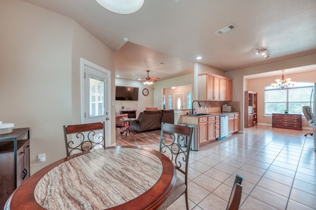 121 Cedar St, Granite Shoals, TX 78654 - dining area with a chandelier, ceiling fan, light tile patterned floors, recessed lighting, and baseboards