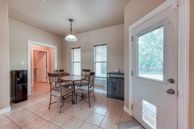 121 Cedar St, Granite Shoals, TX 78654 - dining space featuring baseboards and light tile patterned flooring