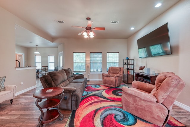 121 Cedar St, Granite Shoals, TX 78654 - living area with ceiling fan, wood finished floors, baseboards, and recessed lighting