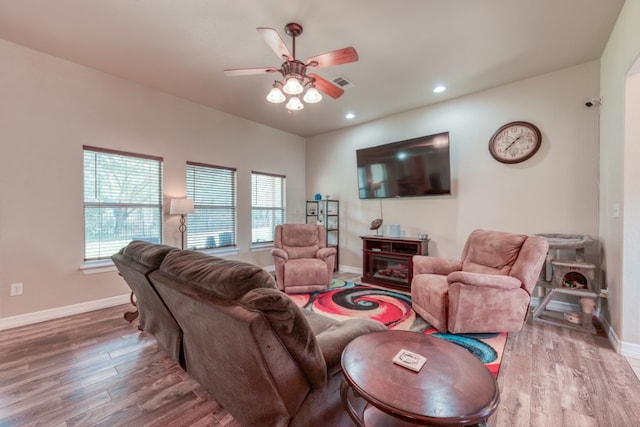 121 Cedar St, Granite Shoals, TX 78654 - living area featuring ceiling fan, wood finished floors, plenty of natural light, and recessed lighting