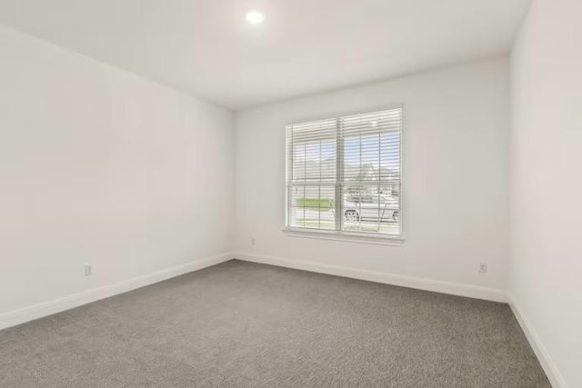 16917 Santiaguillo Trce, Manor, TX 78653 - unfurnished room featuring carpet and baseboards