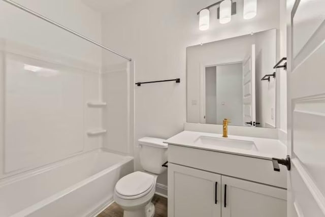 16917 Santiaguillo Trce, Manor, TX 78653 - full bath with toilet, vanity, wood finished floors, and tub / shower combination