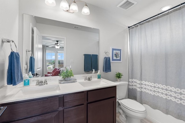 8212 Daisy Cutter Xing, Georgetown, TX 78626 - full bathroom with double vanity, toilet, and ceiling fan