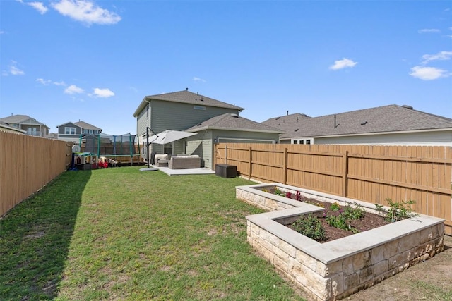 8212 Daisy Cutter Xing, Georgetown, TX 78626 - view of yard with a trampoline, a vegetable garden, and an outdoor hangout area
