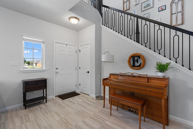 8212 Daisy Cutter Xing, Georgetown, TX 78626 - foyer with stairway and baseboards