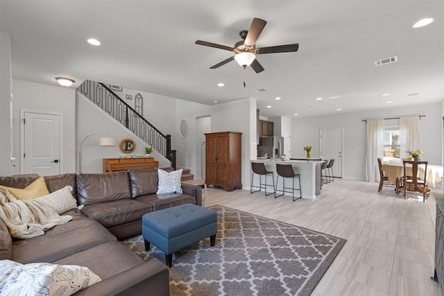 8212 Daisy Cutter Xing, Georgetown, TX 78626 - living area with a ceiling fan, stairway, recessed lighting, and baseboards