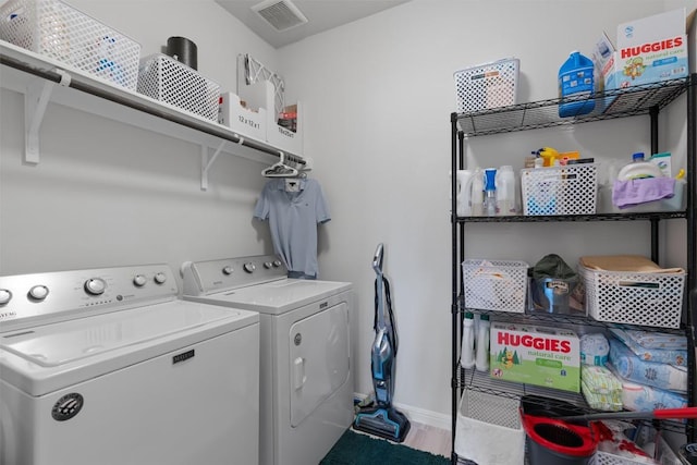 8212 Daisy Cutter Xing, Georgetown, TX 78626 - washroom with washer and dryer and baseboards