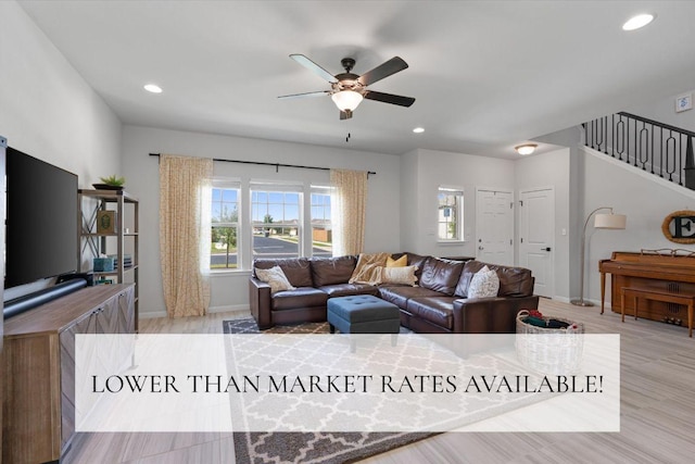 8212 Daisy Cutter Xing, Georgetown, TX 78626 - living area with a ceiling fan, healthy amount of natural light, stairway, recessed lighting, and baseboards